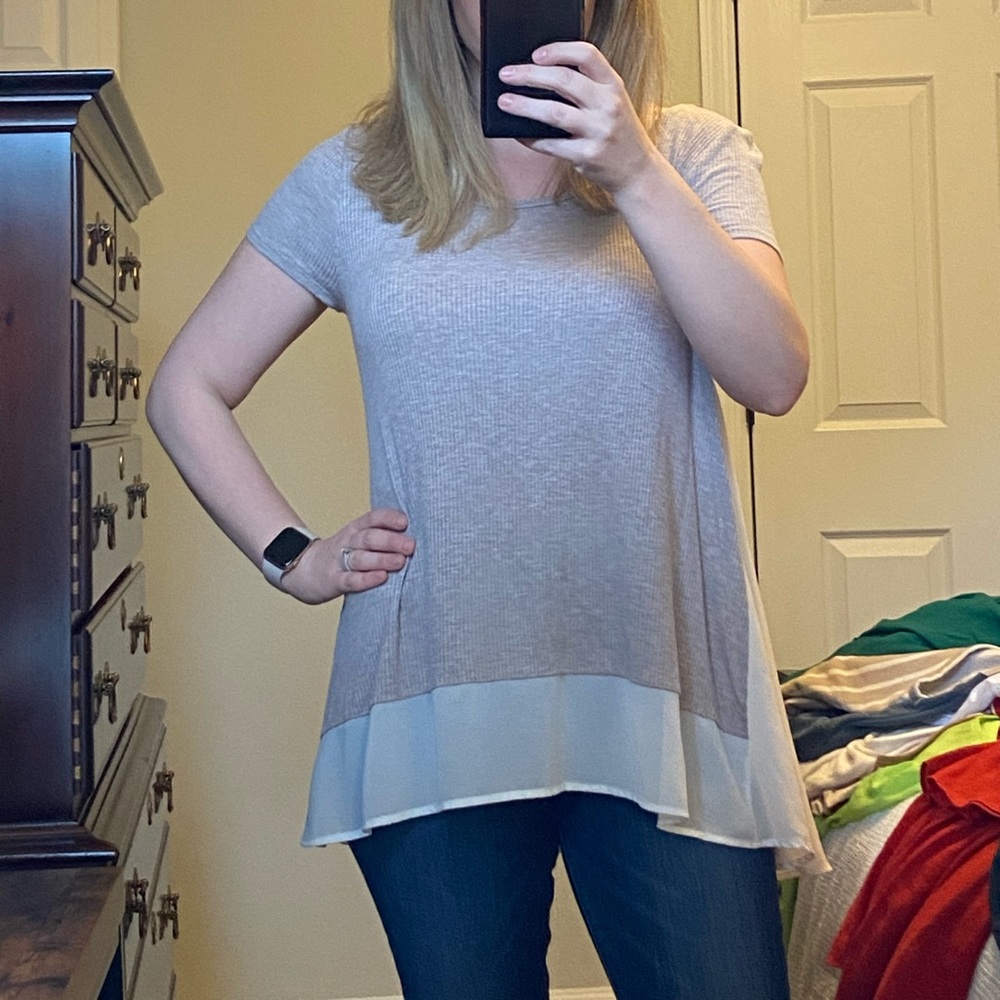 Over women’s top.